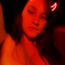 Anny's Red-Hued Moody Vibe from The Sun