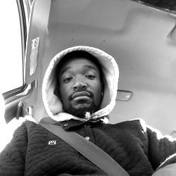 Gottemhooked, in the driver's seat of his car.