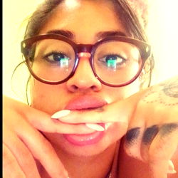 Model in Playful Pose with Mouth Covered