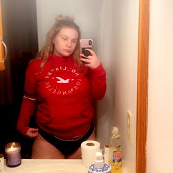 Lex in Bathroom Mirror Reflection