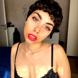 Stylish Woman with Short Hair in Red Lipstick