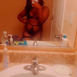 A Sophisticated Bathroom Scene with Madame.Medusa