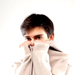 Stylish Man in Hoodie with Finger Under Nose, Santiago