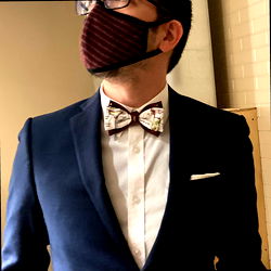 Man in Suit with Face Mask