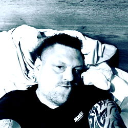 Nottingham Tattooed Man in Black Shirt