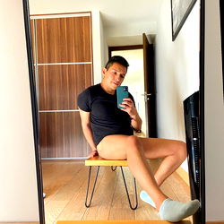 Model in Studio, Taking Selfie