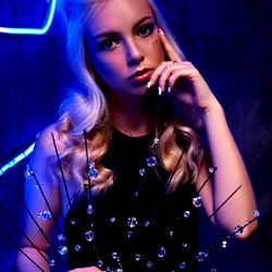 Olivia - Glamorous Model Photoshoot with Sparkles and Beaded Fringe Background