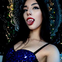 Grimm, OnlyFans Model in Blue Lingerie, Makeup and Shades of Red and Black