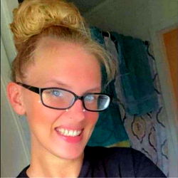 Woman in Glasses with Smile