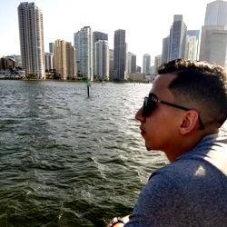 Jay A, Cityscape View in Background