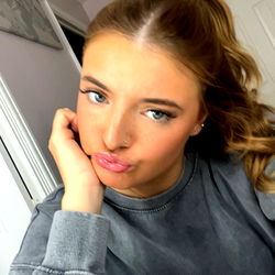 Amy's Playful Pose in a Casual Sweatshirt