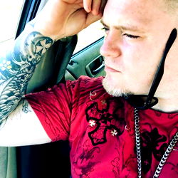 Cincinnati Tattooed Skull Guy in Red Shirt