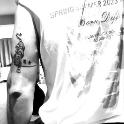 Person with Tattoo Standing in London, UK