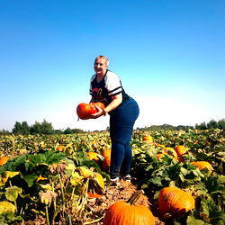 Ashlyn Sparks in a Field of Pumpkins