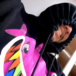 Aaron Sanchez, onlyfans model in vibrant hoodie