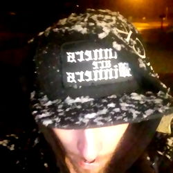 Addy, the Camouflage Hat Wearing Individual