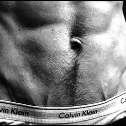 Allen James Fitness Model Showcasing Abs and Calvin Klein Underwear