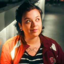 Luci, a young woman with tattoos