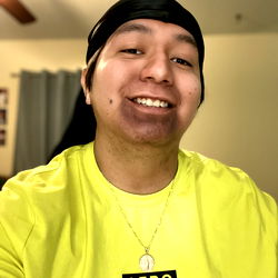 Smiling Man in Yellow T-Shirt and Face Mask