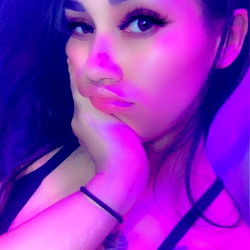 Spoiled Jane's Playful Expression in a Pink Room