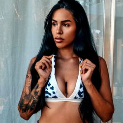 Ash: A Model in a Tank Top and Short Hair