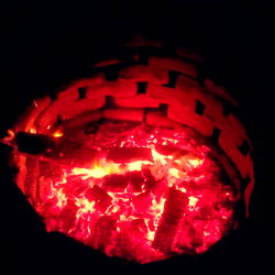 Dad Bod: A Cozy Scene of an Outdoor Fireplace