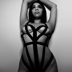 Lala, Sexy Model in Racy Leash and Cage Lingerie