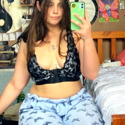 Aaliyah, model in a bedroom