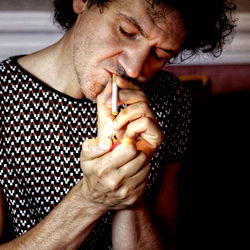 Onlyfans Model With Cigarette and Phone in Hand