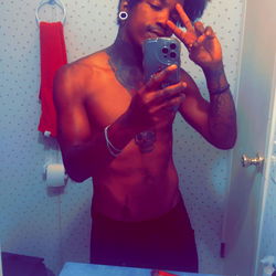 Shirtless Fitness Model in Bathroom Mirror