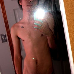 A Fitness Enthusiast Shows Off His Abs