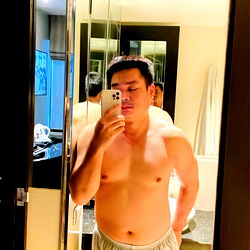 Model Taking Selfie in Mirror