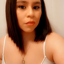 Ana, a Young Woman with Short Hair and Tattoos