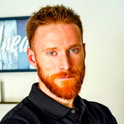 Red Best, a Bearded Man in a Suit