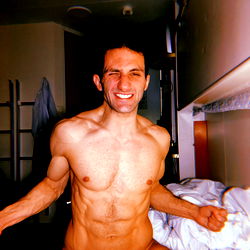 Fitness Model Alexey Showing Off Abs