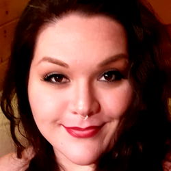 A Night With Nyx, a vibrant and lively social media influencer posing for the camera with a smile on her face.