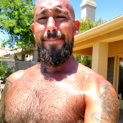 Onlyfans Model in Tattoo-filled Shirt