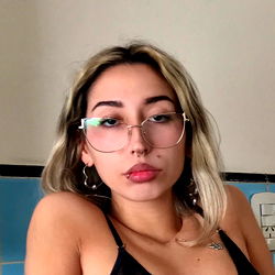 Trendy OnlyFans Model with Glasses and Silver Hair