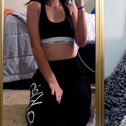 Young Adult Woman in Fitness Attire