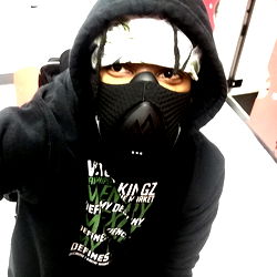 Sam, Atlanta-Based OnlyFans Model Posing in a Hoodie and Face Mask