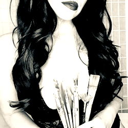 Artistic Model Babe Rozz Posing with Paintbrushes
