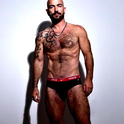 Mick Lover, a fit model posing for OnlyFans