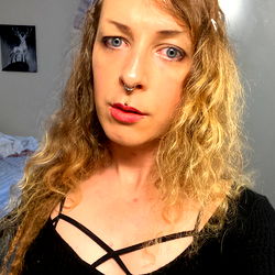 A Model Selfie with a Tattoo and a Unique Style