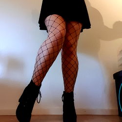 Stylish Woman in Fishnet Stockings