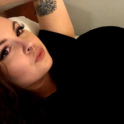 Avobhabie: A Stylish Model Showcasing Her Unique Tattoo