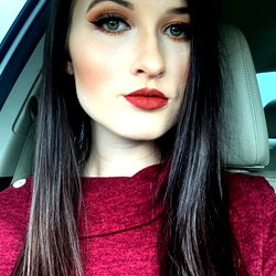 Stylish Beauty in a Red Sweater