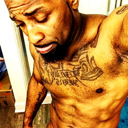 Onlyfans Model Posing in Front of Mirror with Shirt Off