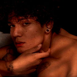 Ander, a striking OnlyFans model photographed in black and white