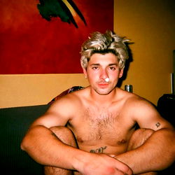 A Man's Expressive Pose and Style