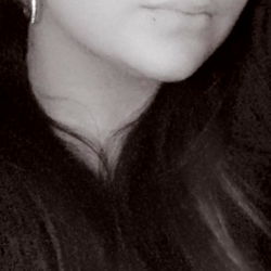 Angel, a young adult female with a strong presence.